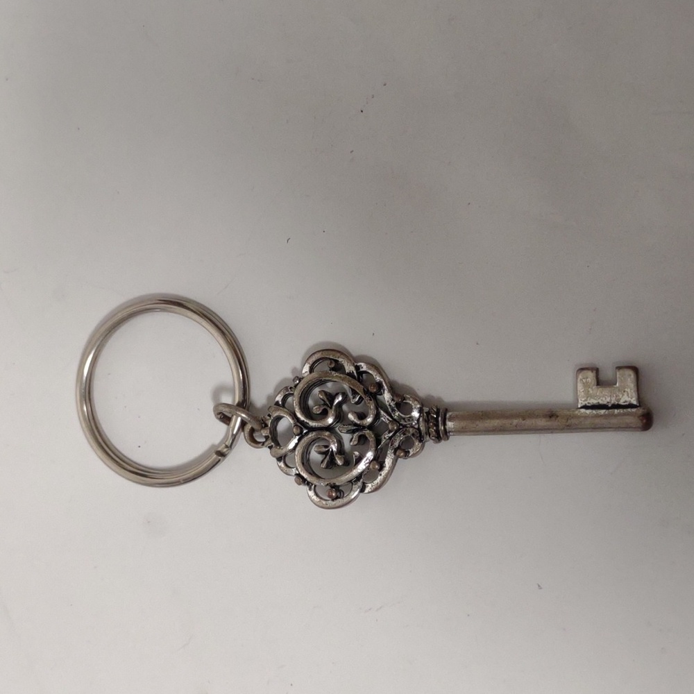 Silver toned skeleton key keychain/bag charm